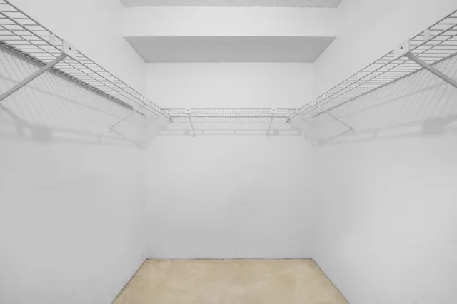 a view of a room with racks on the wall