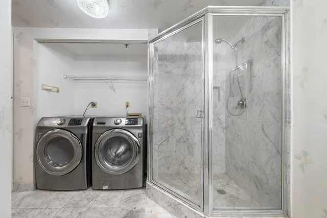 a utility room with dryer and washer