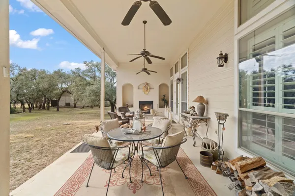 a view of a dining room with furniture wooden floor and chandelier