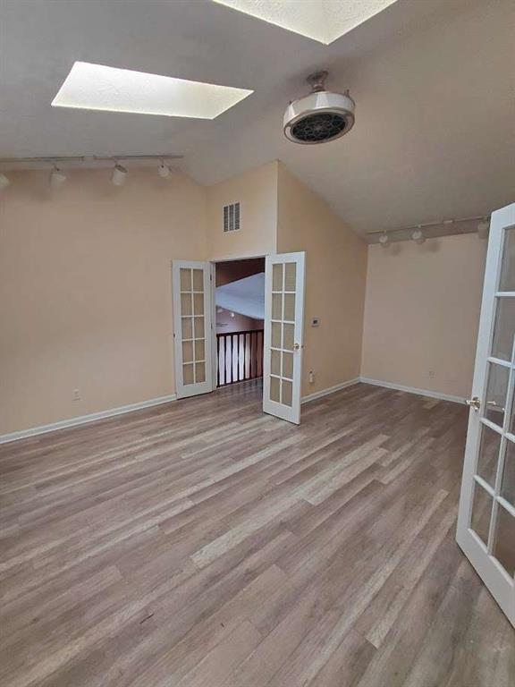 2291 Wilkins Court Decatur, GA 30035 - Photo 10 of 19 a view of a livingroom with wooden floor and a ceiling fan