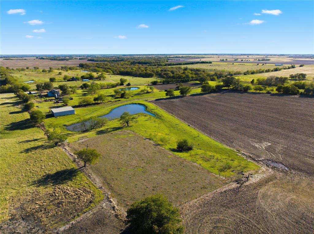 2663 West Crabb Road West, TX 76691 - Photo 6 of 22 Overview of rural landscape with farmland and a large body of water