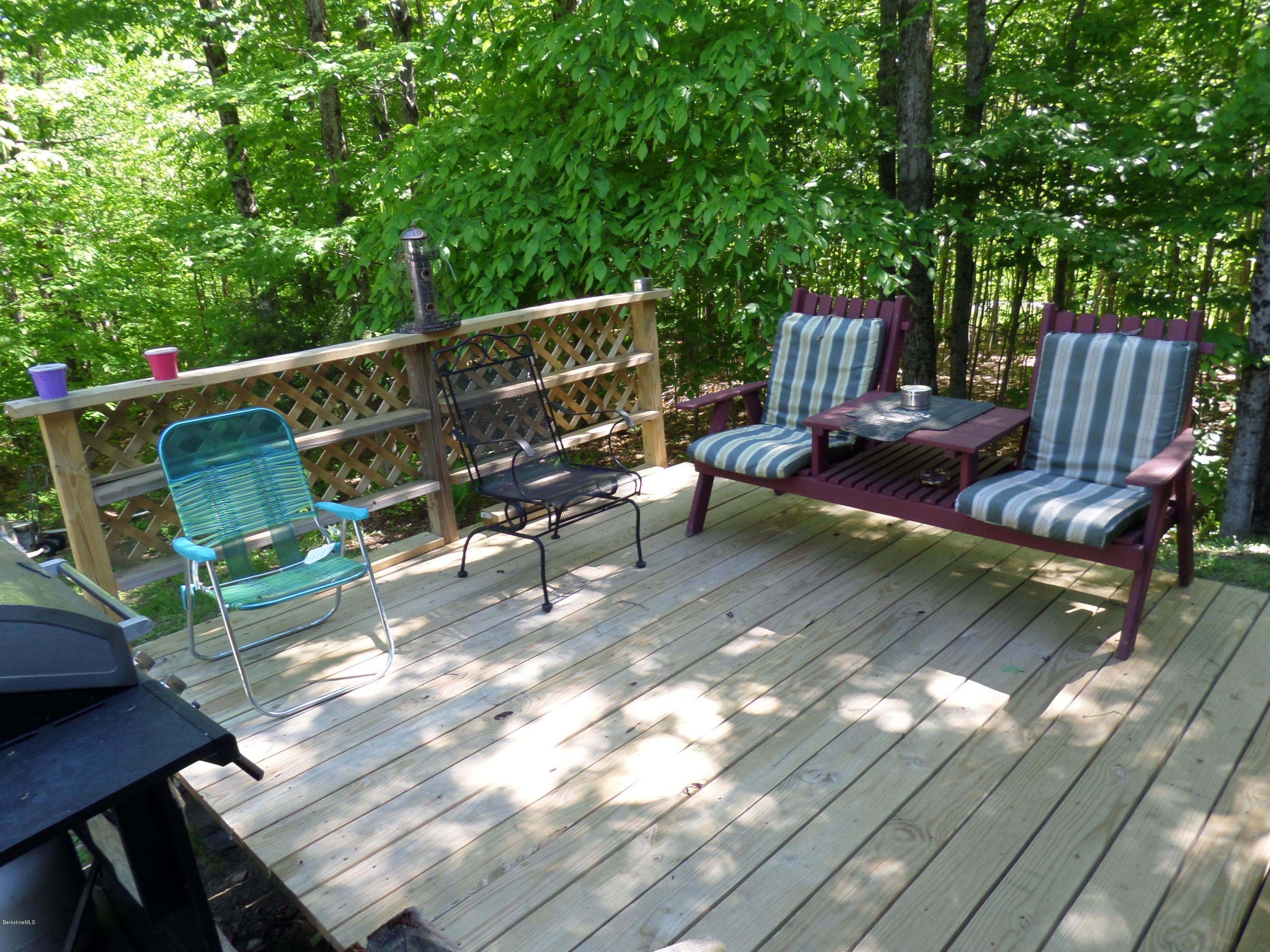800 Sportsman Road Stamford, VT 05352 - Photo 6 of 26 a view of a chairs in a patio