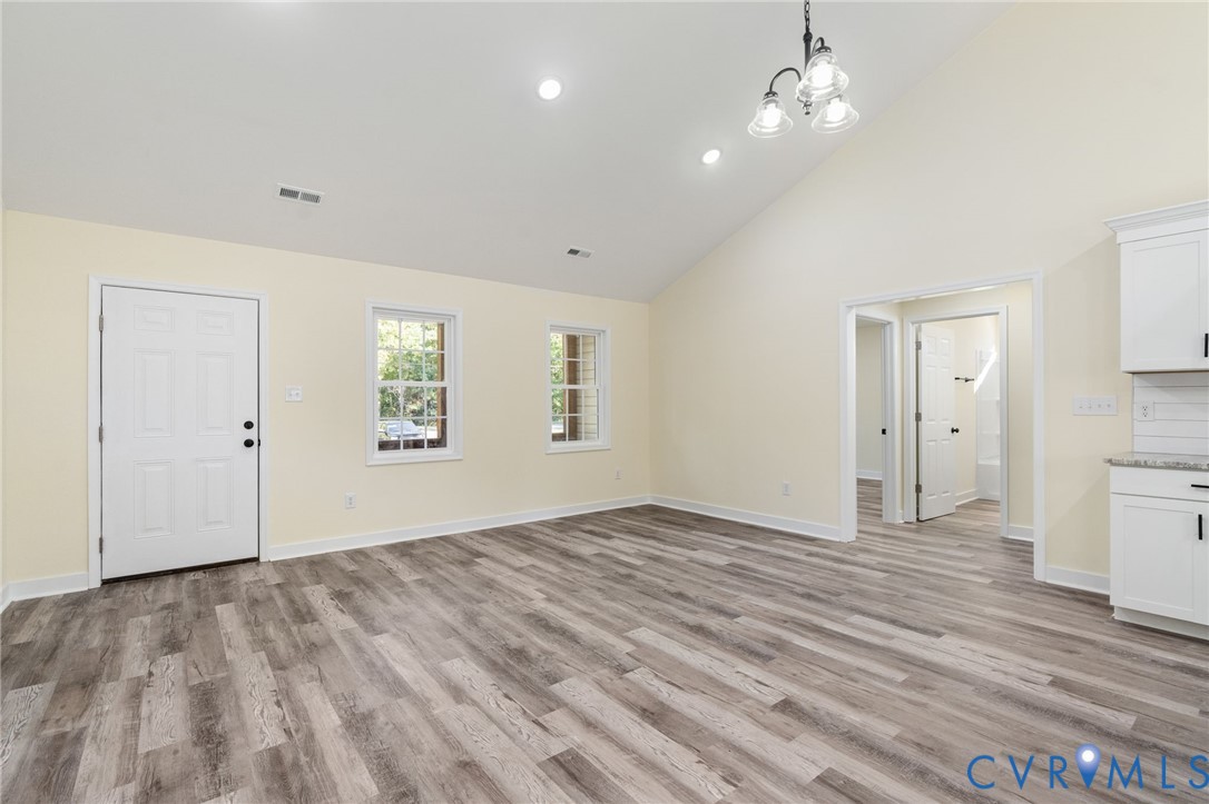 11206 South Crater Road Petersburg, VA 23805 - Photo 12 of 19 wooden floor in an empty room with a window