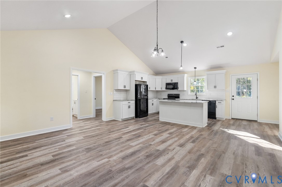 11206 South Crater Road Petersburg, VA 23805 - Photo 10 of 19 a large kitchen with cabinets and stainless steel appliances