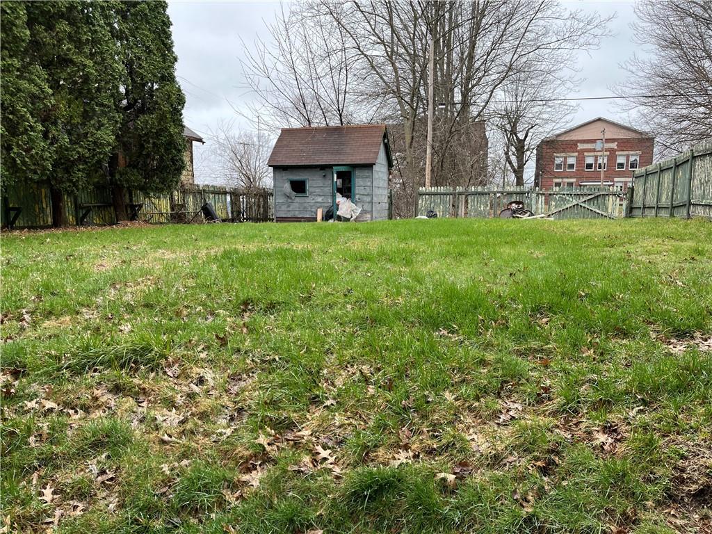 802 Wallis Avenue Farrell, PA 16121 - Photo 4 of 6 a view of a house with a yard
