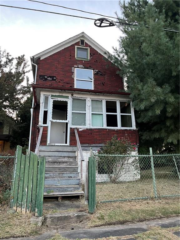 802 Wallis Avenue Farrell, PA 16121 - Photo 6 of 6 a front view of a house with a yard