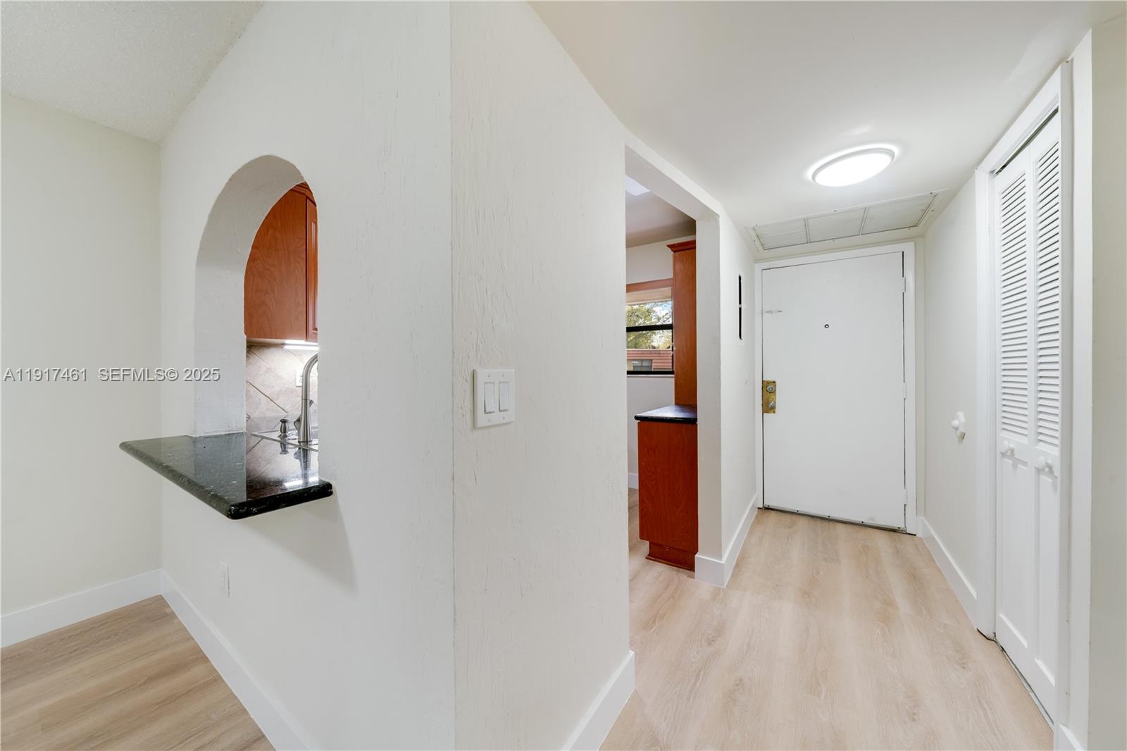 14847 Southwest 104th Street, Unit 10203 Miami, FL 33196 - Photo 13 of 22 a bathroom with a sink and a mirror