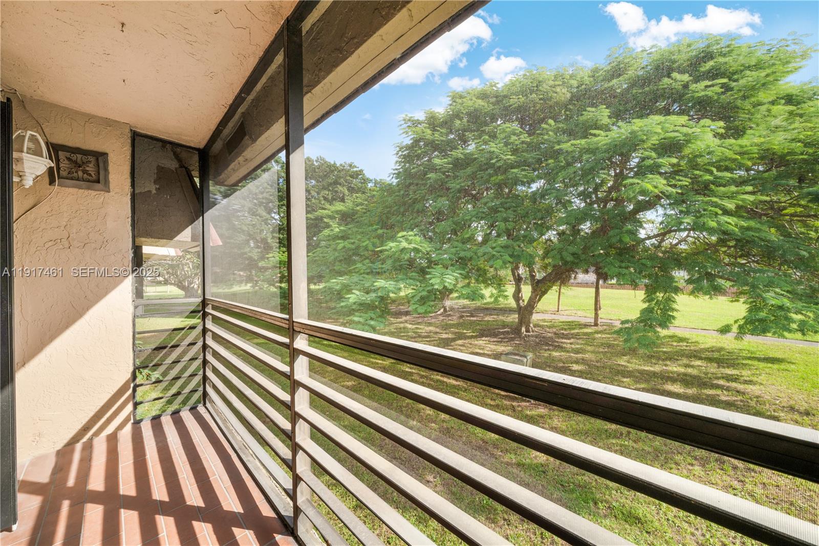 14847 Southwest 104th Street, Unit 10203 Miami, FL 33196 - Photo 2 of 22 a view of outdoor space and deck