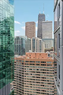 a view of a city with tall buildings