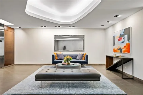 a kitchen with a table and chairs