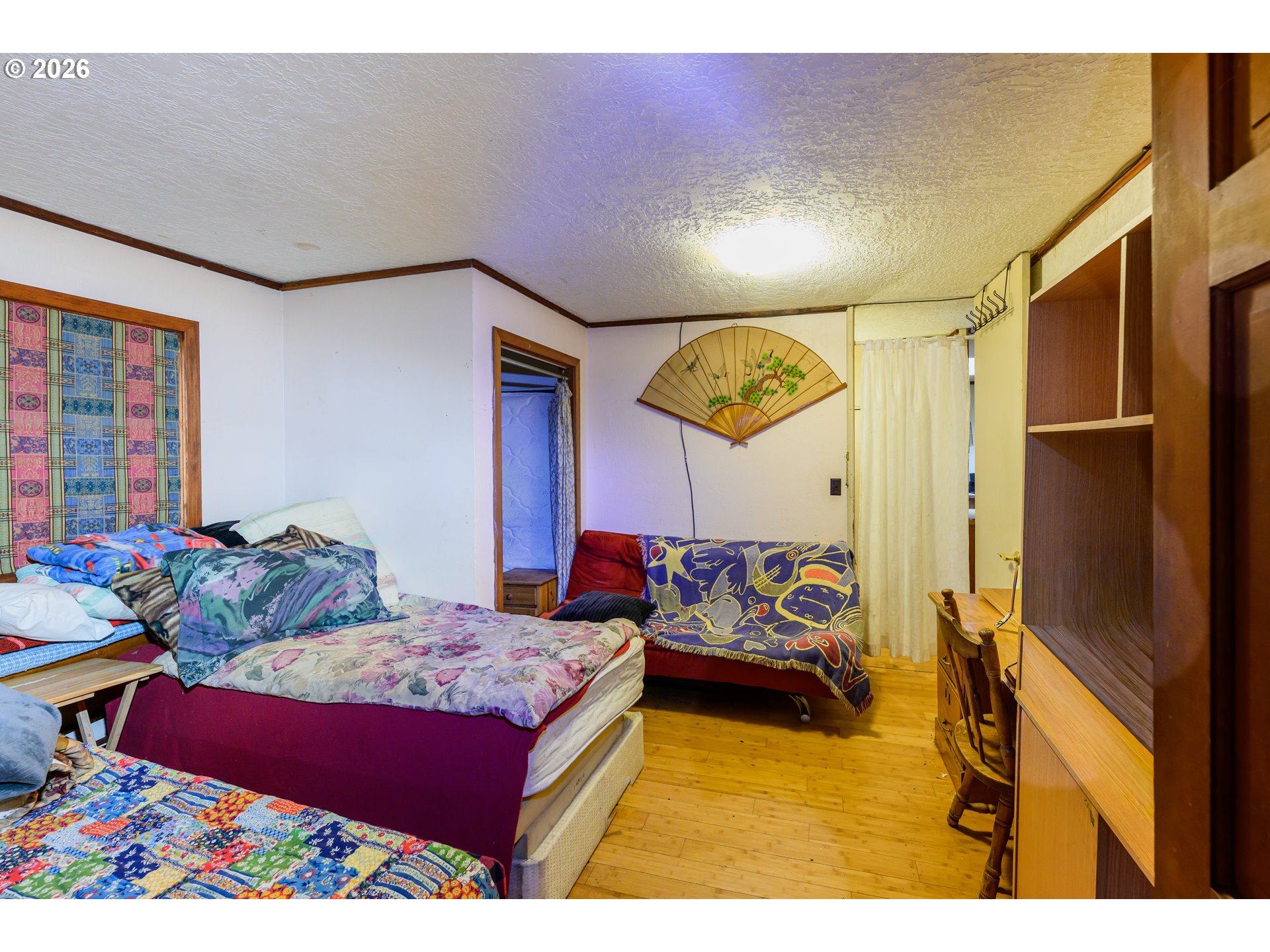 1377 Moonshine Park Road Logsden, OR 97357 - Photo 13 of 40 a bedroom with furniture and a bed