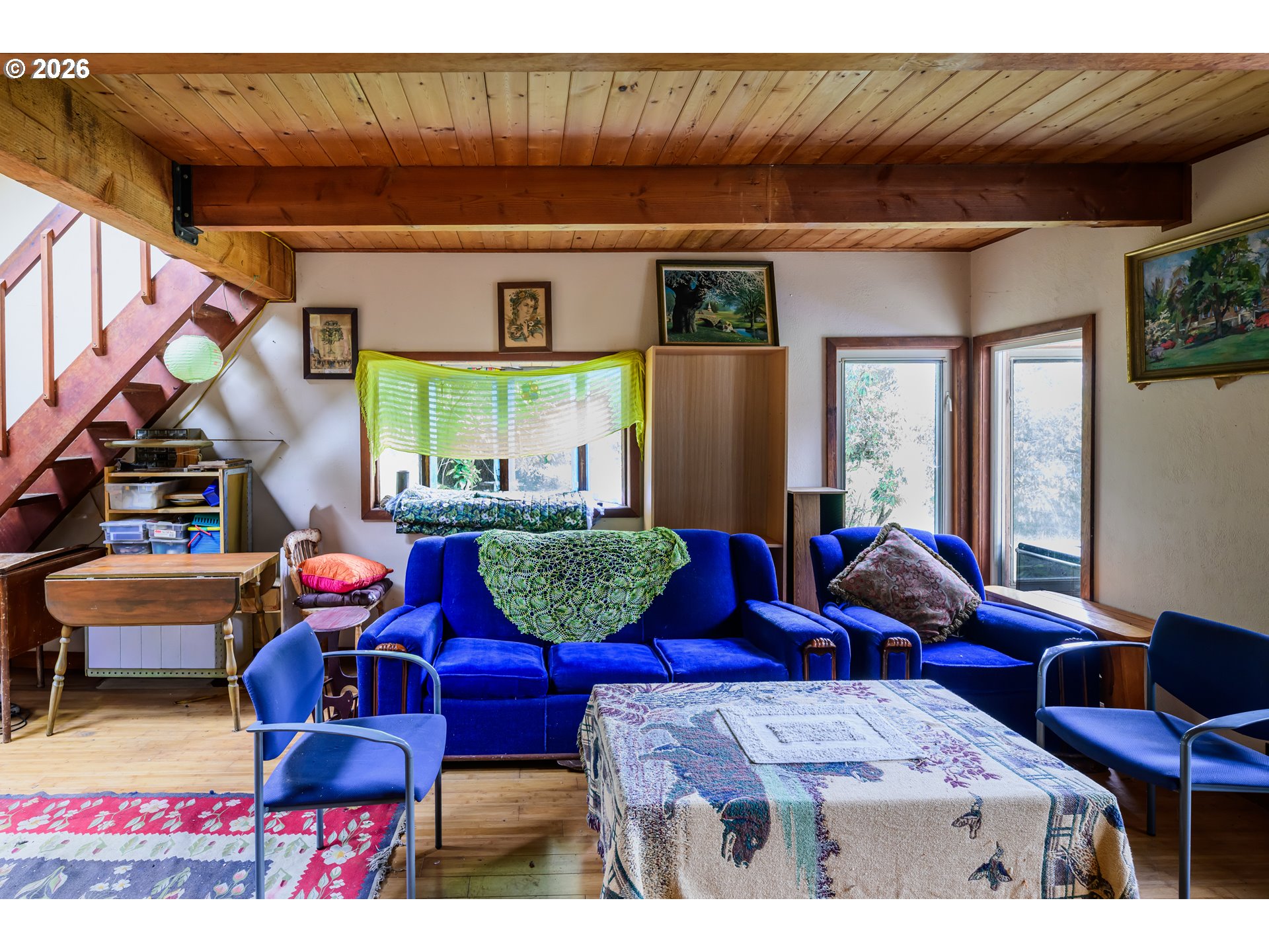 1377 Moonshine Park Road Logsden, OR 97357 - Photo 15 of 40 a living room with furniture a rug and a window