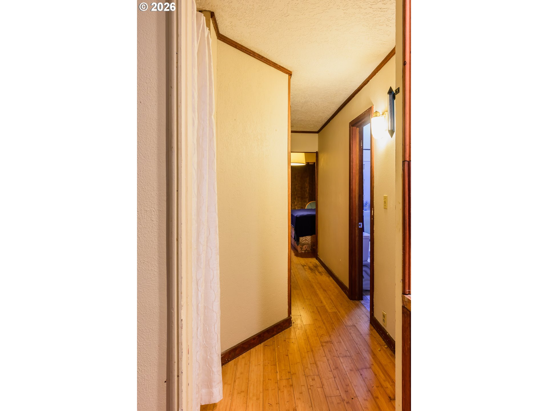 1377 Moonshine Park Road Logsden, OR 97357 - Photo 26 of 40 a view of a hallway with wooden floor
