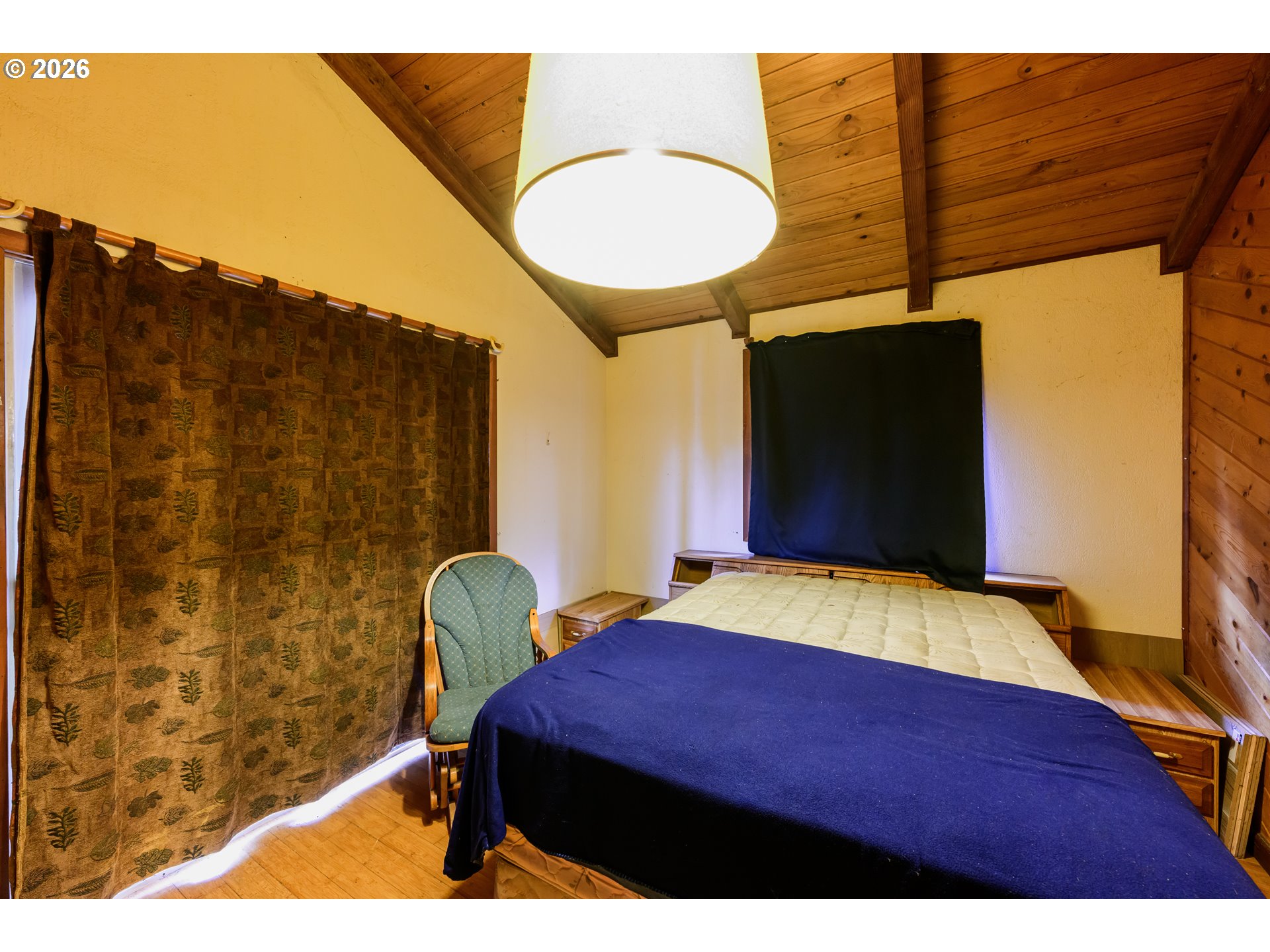 1377 Moonshine Park Road Logsden, OR 97357 - Photo 29 of 40 a bedroom with a bed and a dresser