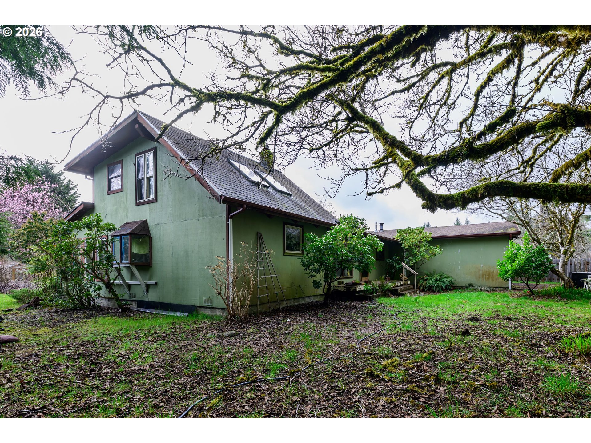 1377 Moonshine Park Road Logsden, OR 97357 - Photo 38 of 40 a view of a house with a yard