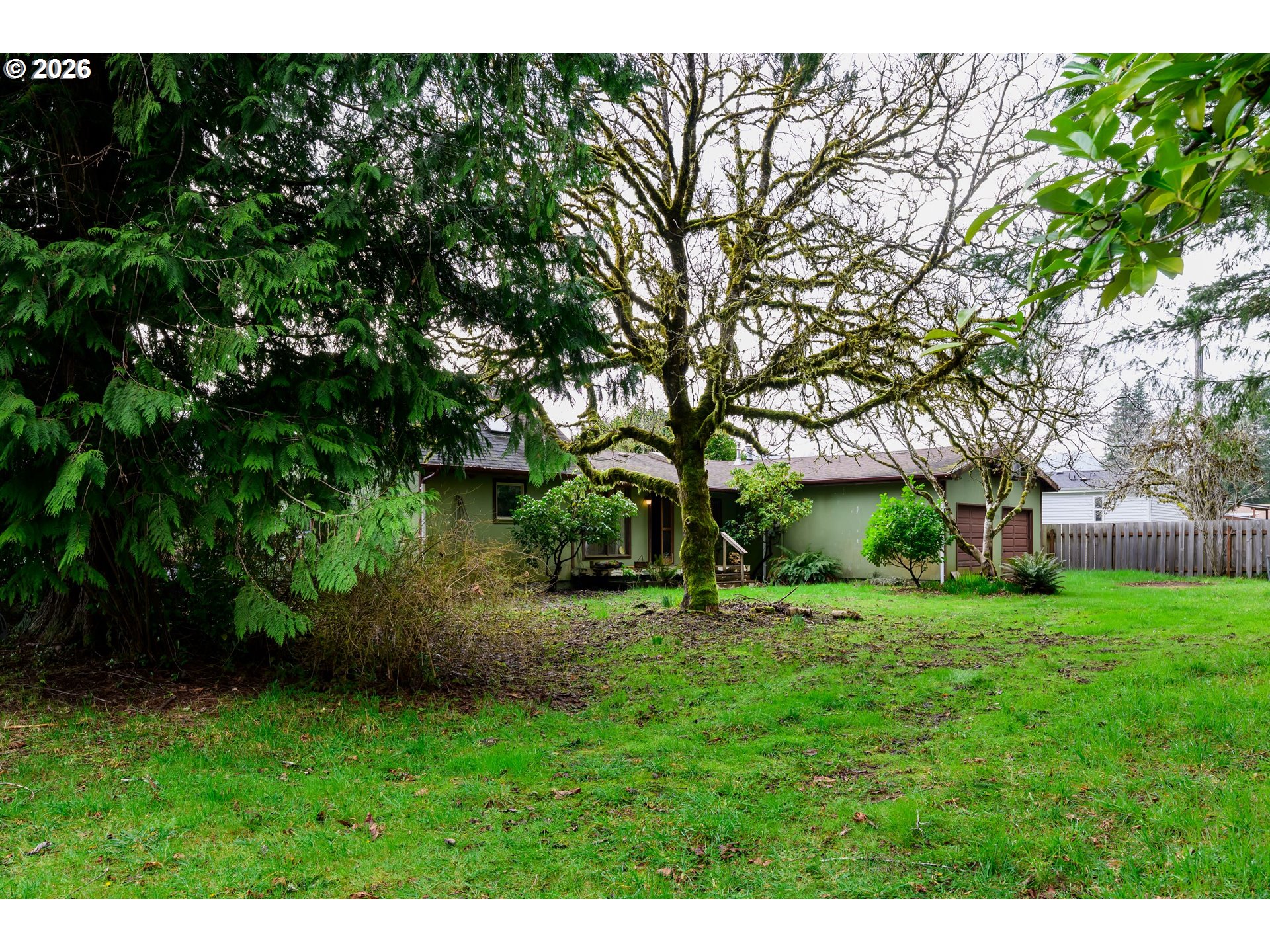 1377 Moonshine Park Road Logsden, OR 97357 - Photo 40 of 40 a view of a backyard with large trees