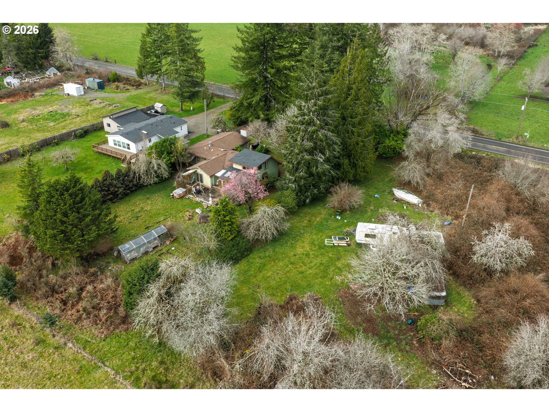 1377 Moonshine Park Road Logsden, OR 97357 - Photo 7 of 40 a view of a town with lush green forest