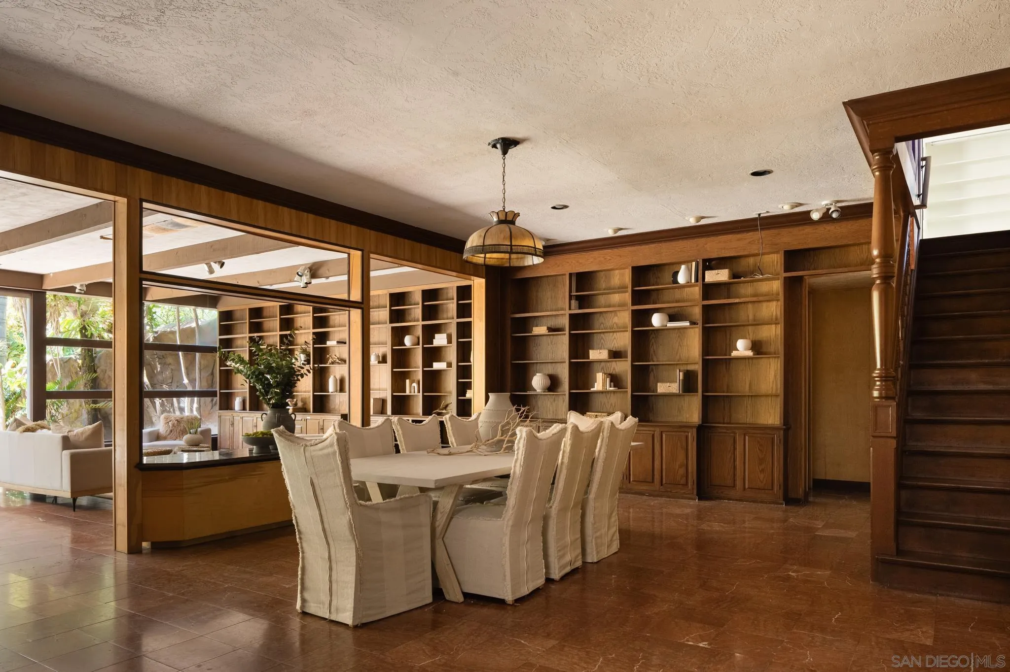 1010 Myrtle Way San Diego, CA 92103 - Photo 13 of 70 a dining room with furniture water view and a floor to ceiling window