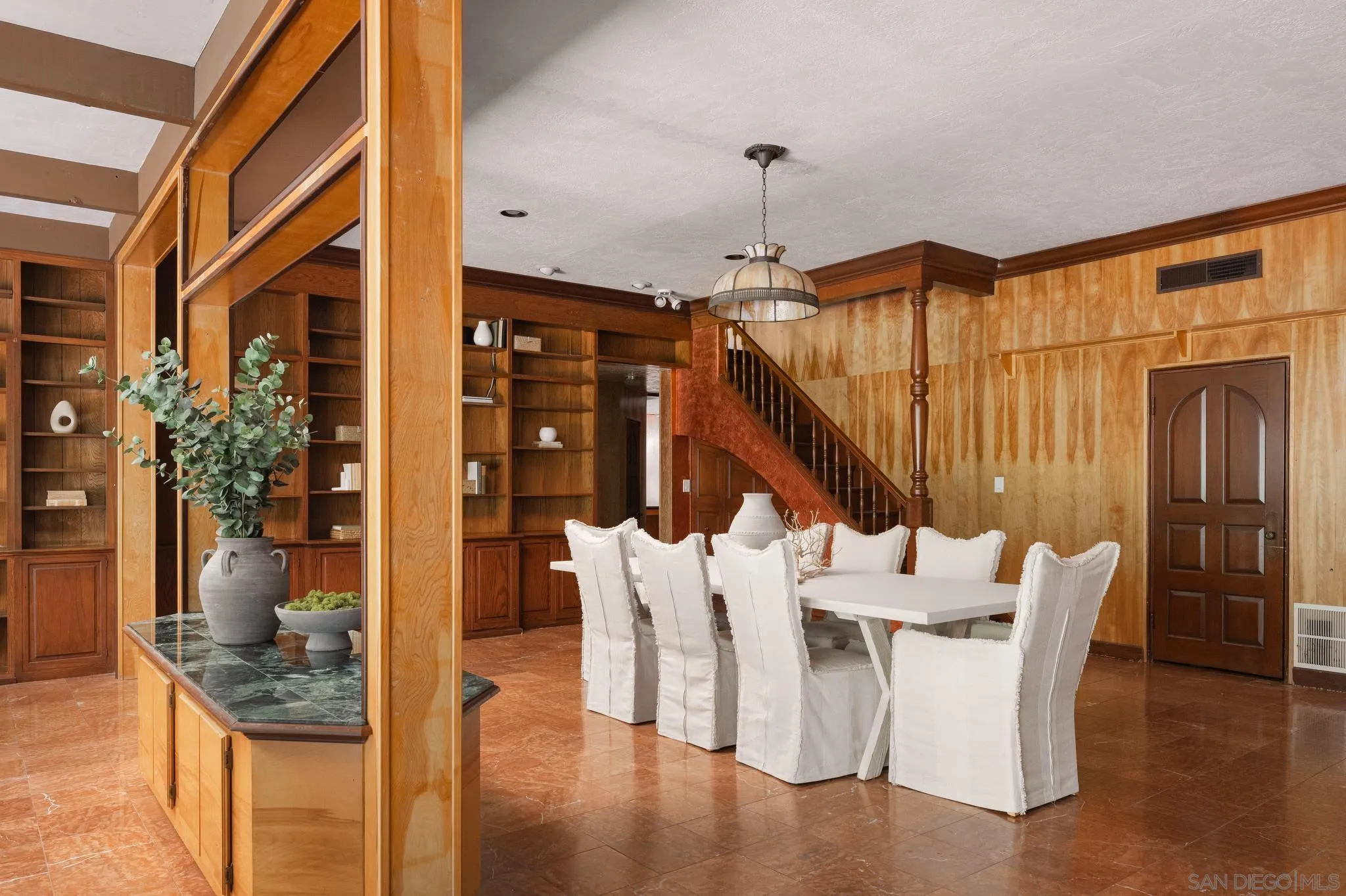 1010 Myrtle Way San Diego, CA 92103 - Photo 14 of 70 a dining room with furniture and wooden floor