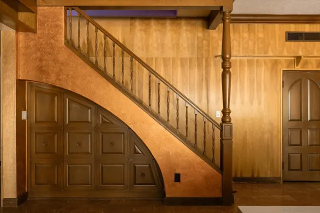 a kitchen with a stove and a refrigerator