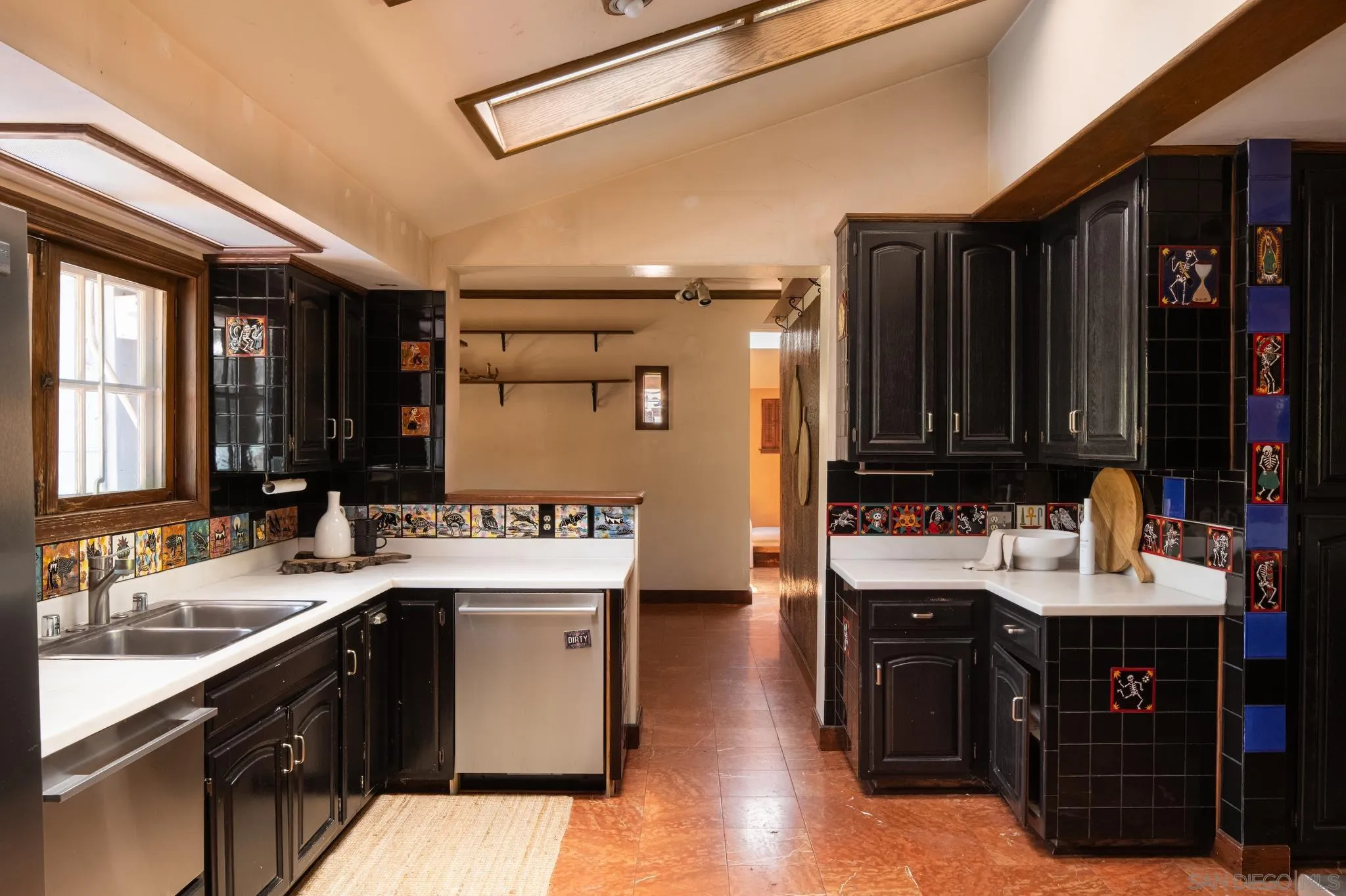 1010 Myrtle Way San Diego, CA 92103 - Photo 18 of 70 a bathroom with a sink double vanity and a mirror