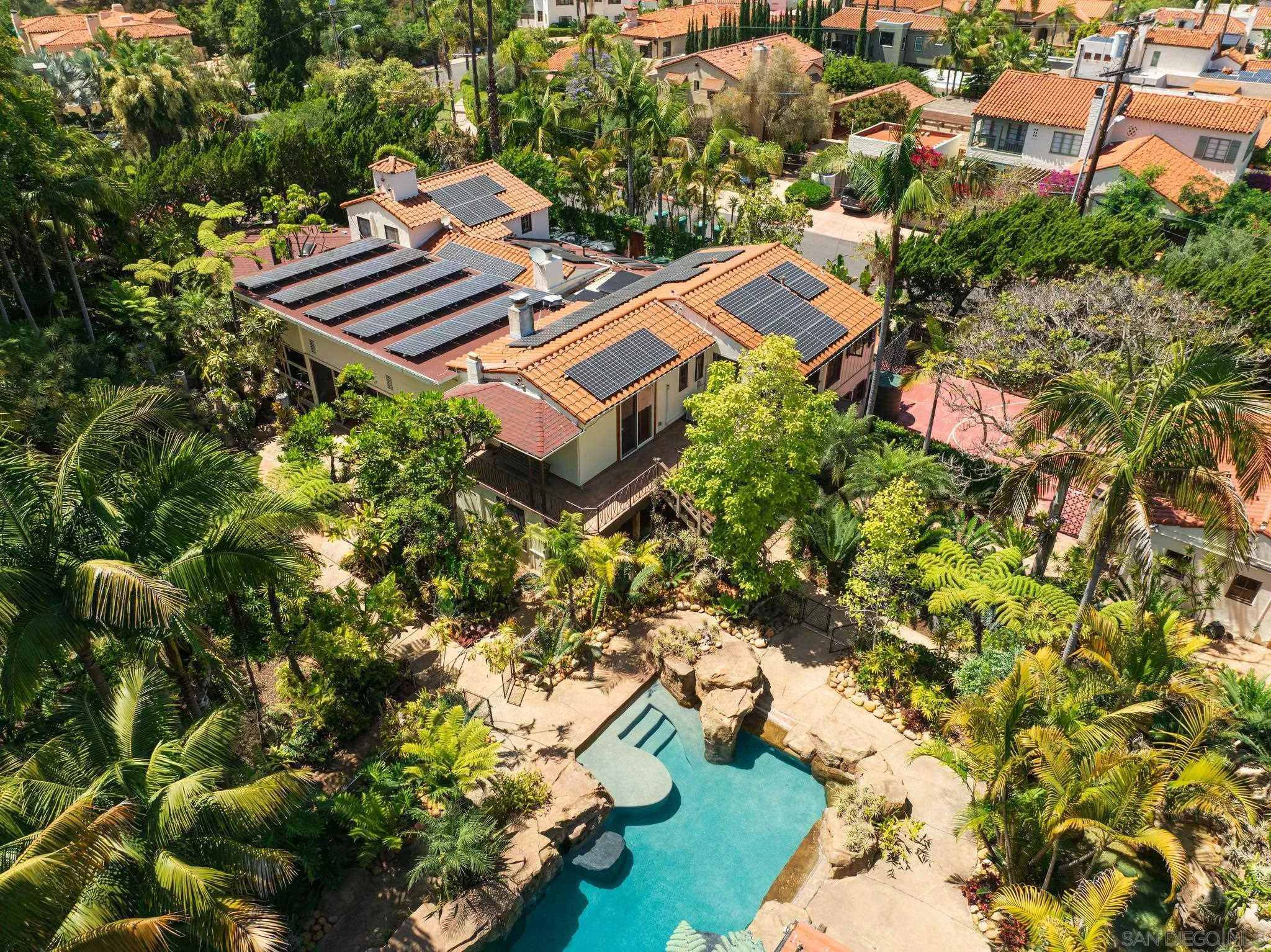 1010 Myrtle Way San Diego, CA 92103 - Photo 2 of 70 an aerial view of a house with a yard and lake view