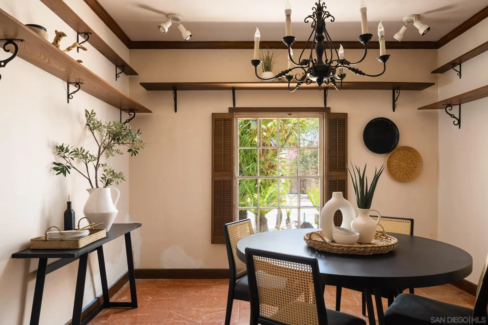1010 Myrtle Way San Diego, CA 92103 - Photo 21 of 70 a view of a dining room with furniture and chandelier