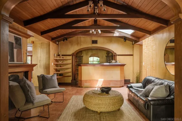 a bedroom with a bed and cabinets