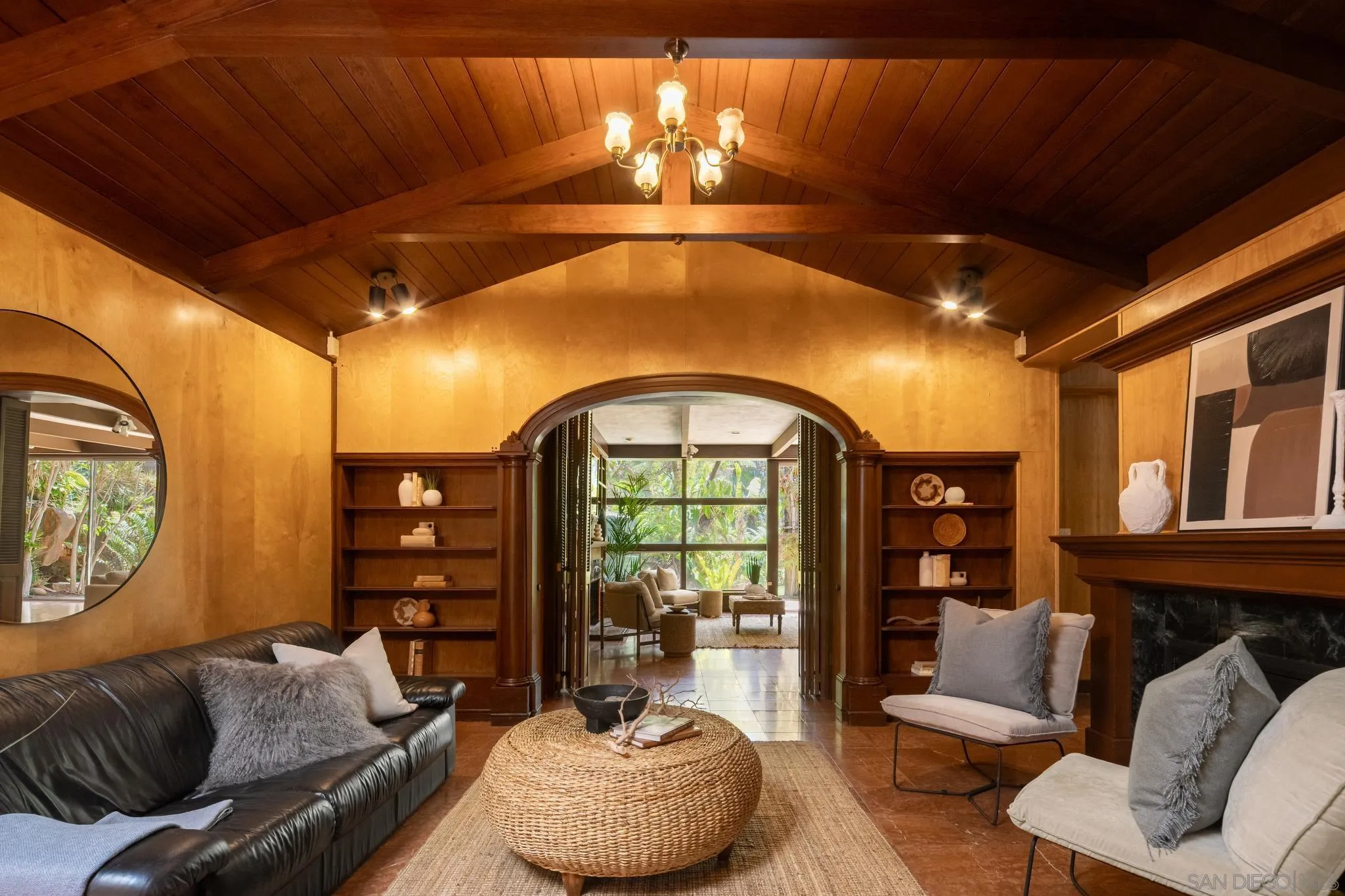 1010 Myrtle Way San Diego, CA 92103 - Photo 25 of 70 a living room with furniture and a floor to ceiling window