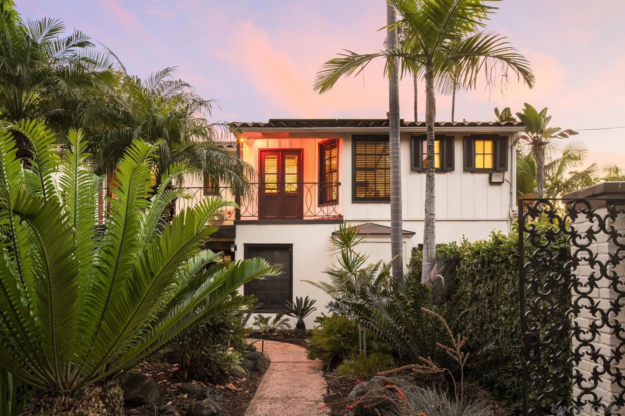 1010 Myrtle Way San Diego, CA 92103 - Photo 3 of 70 a front view of a house with a garden