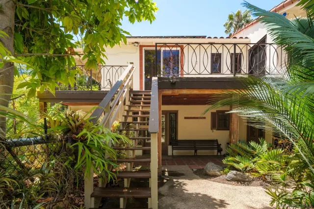 a view of a livingroom with furniture and windows