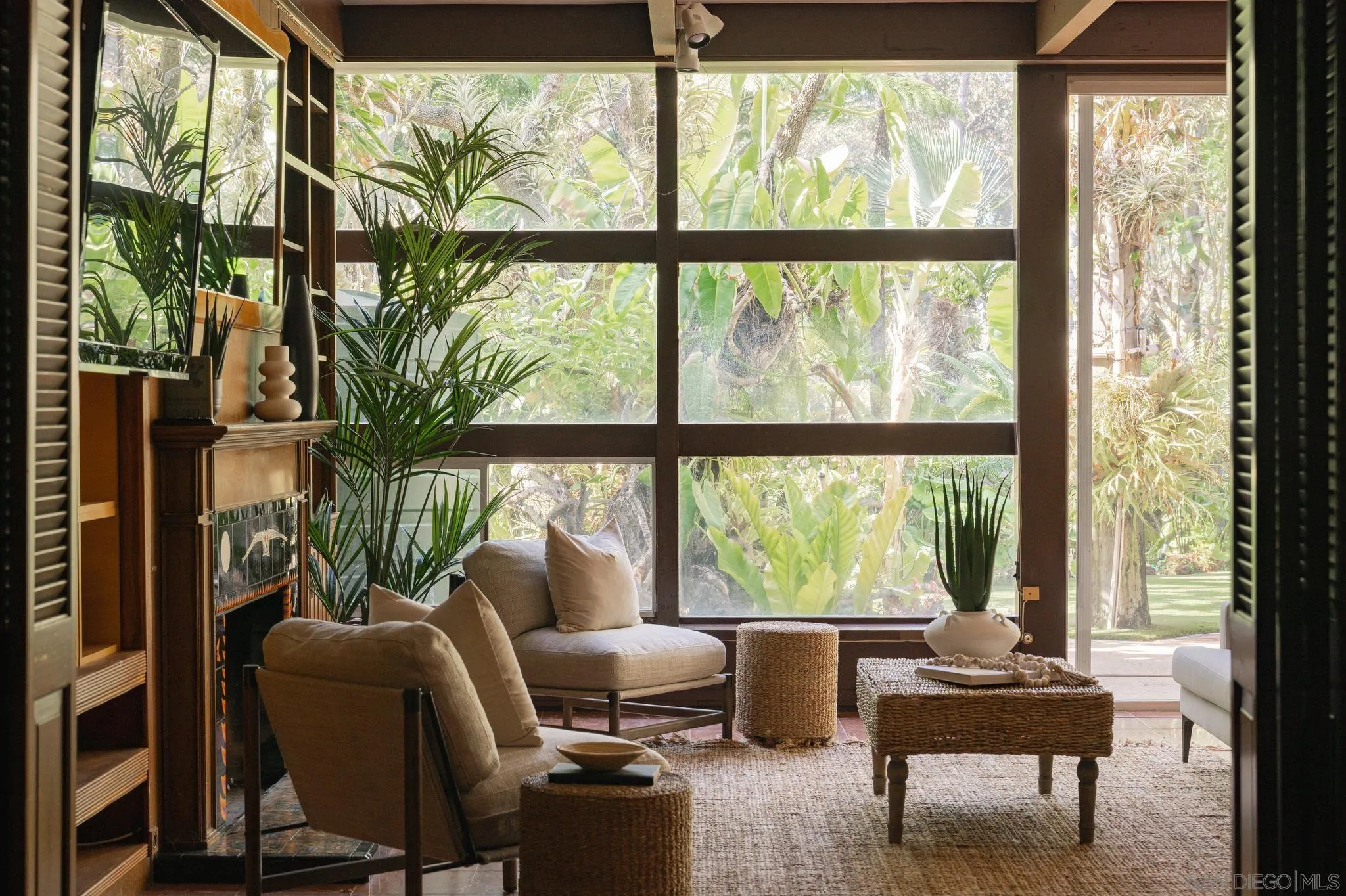 1010 Myrtle Way San Diego, CA 92103 - Photo 5 of 70 a living room with furniture and large windows