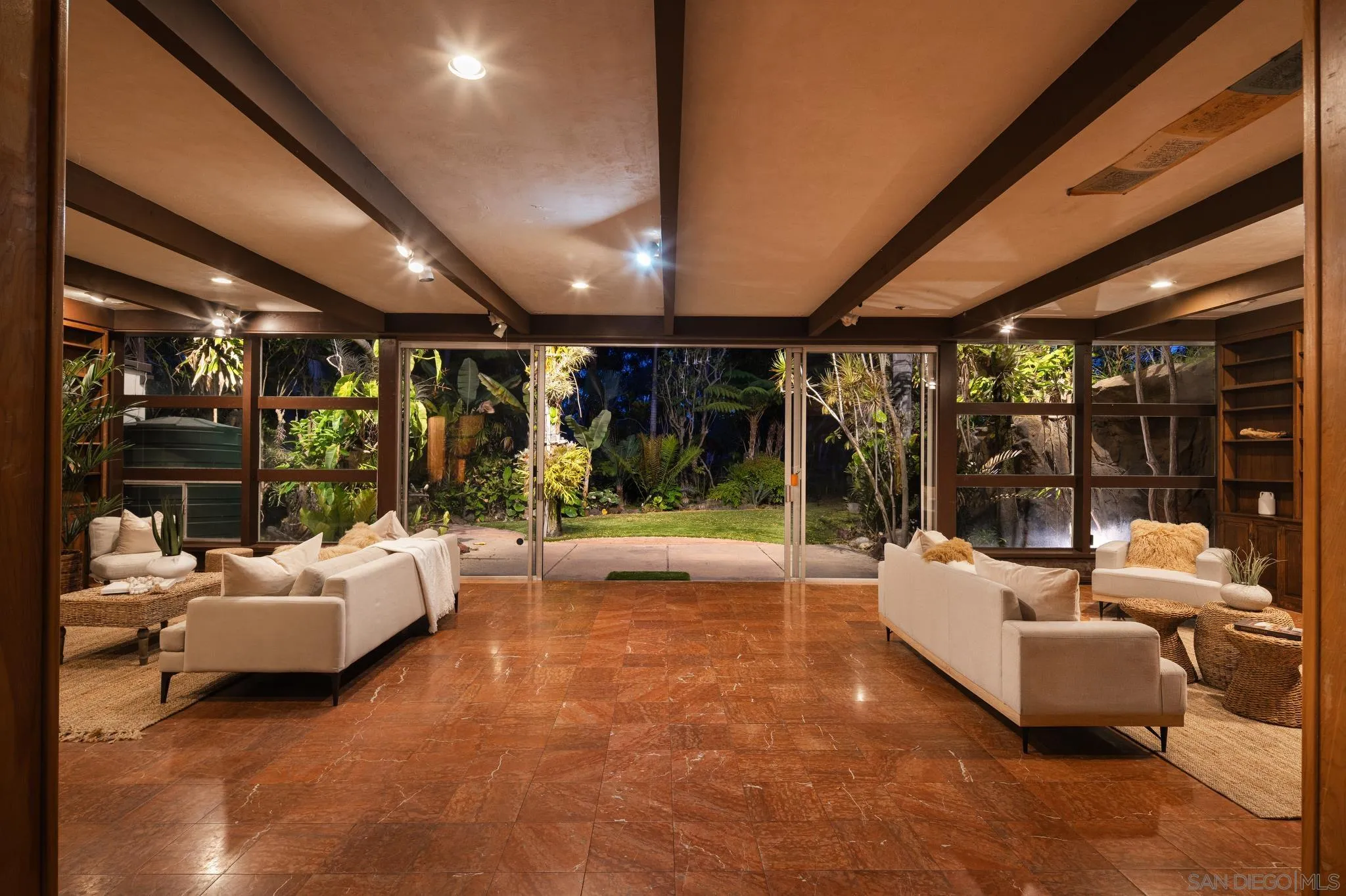 1010 Myrtle Way San Diego, CA 92103 - Photo 8 of 70 a bedroom with furniture and large windows