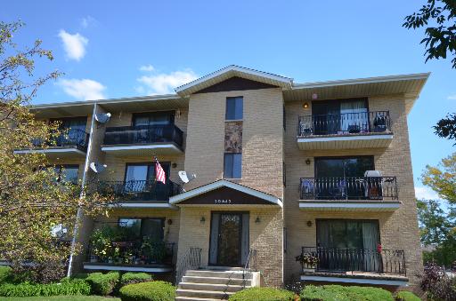 10643 Major Avenue, Unit 3D Chicago Ridge, IL 60415 - Photo 1 of 8 a front view of a house with garden