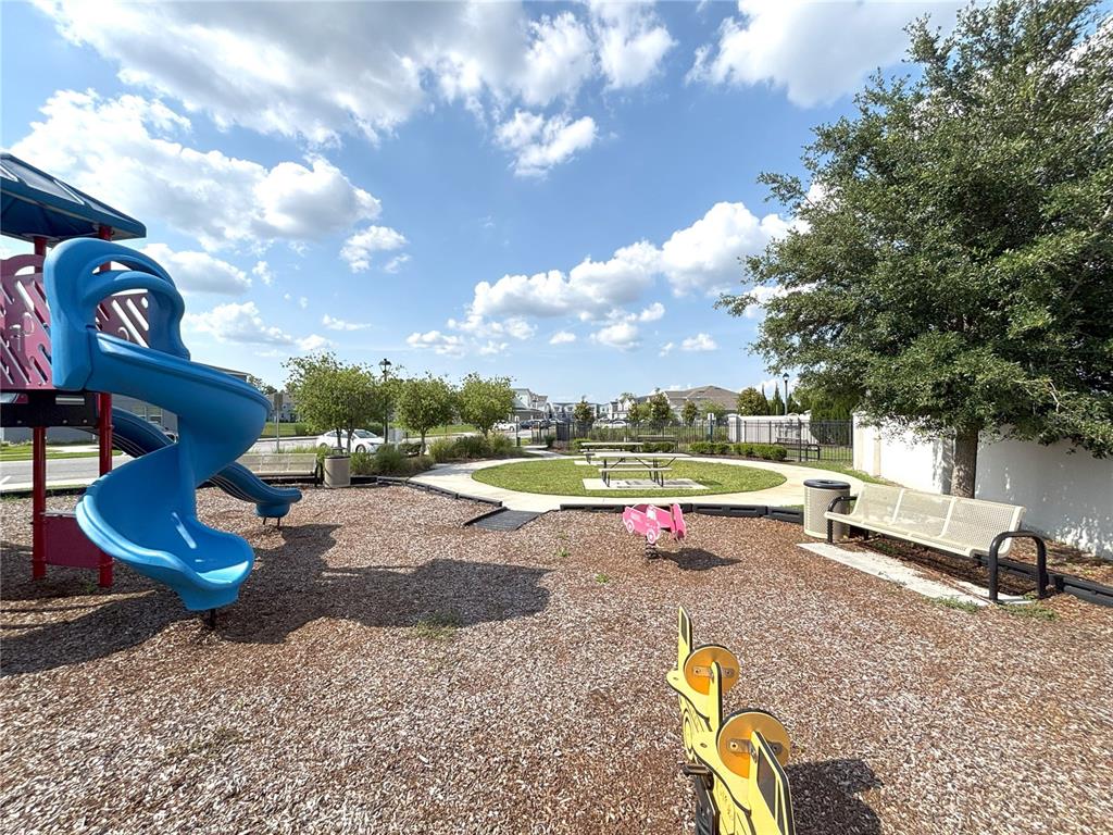 921 Spring Palms Loop Orlando, FL 32828 - Photo 24 of 30 a view of outdoor space with seating area