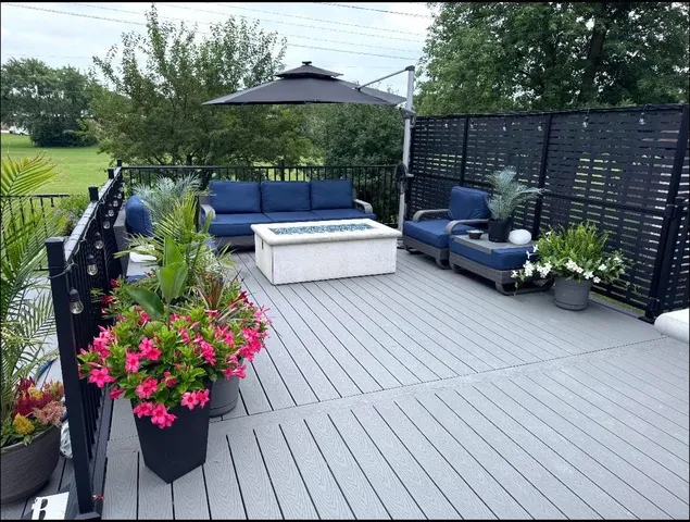 a view of a couches on the roof deck