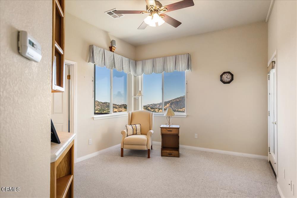 30730 Fox Ridge Court Tehachapi, CA 93561 - Photo 24 of 61 a living room with furniture and a window