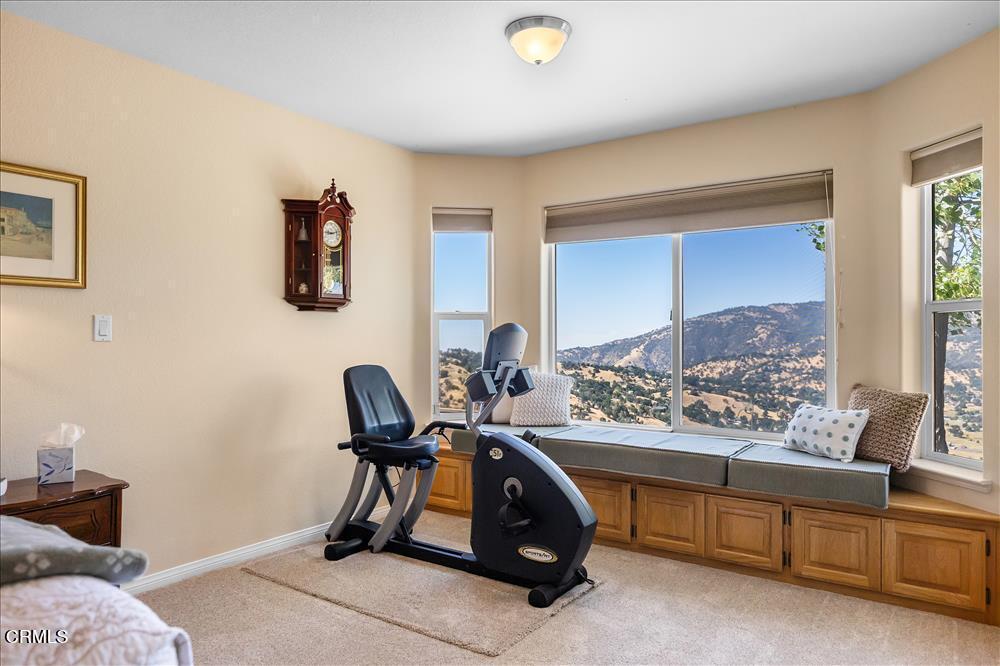 30730 Fox Ridge Court Tehachapi, CA 93561 - Photo 35 of 61 a view of a workspace with furniture and a window