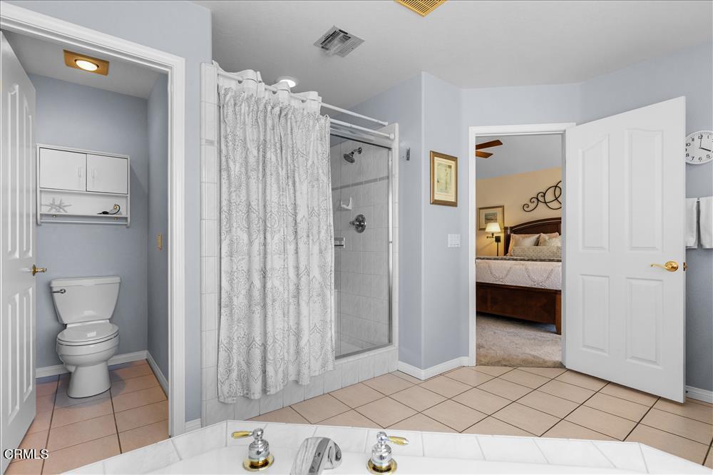 30730 Fox Ridge Court Tehachapi, CA 93561 - Photo 37 of 61 a bathroom with a sink a toilet and shower