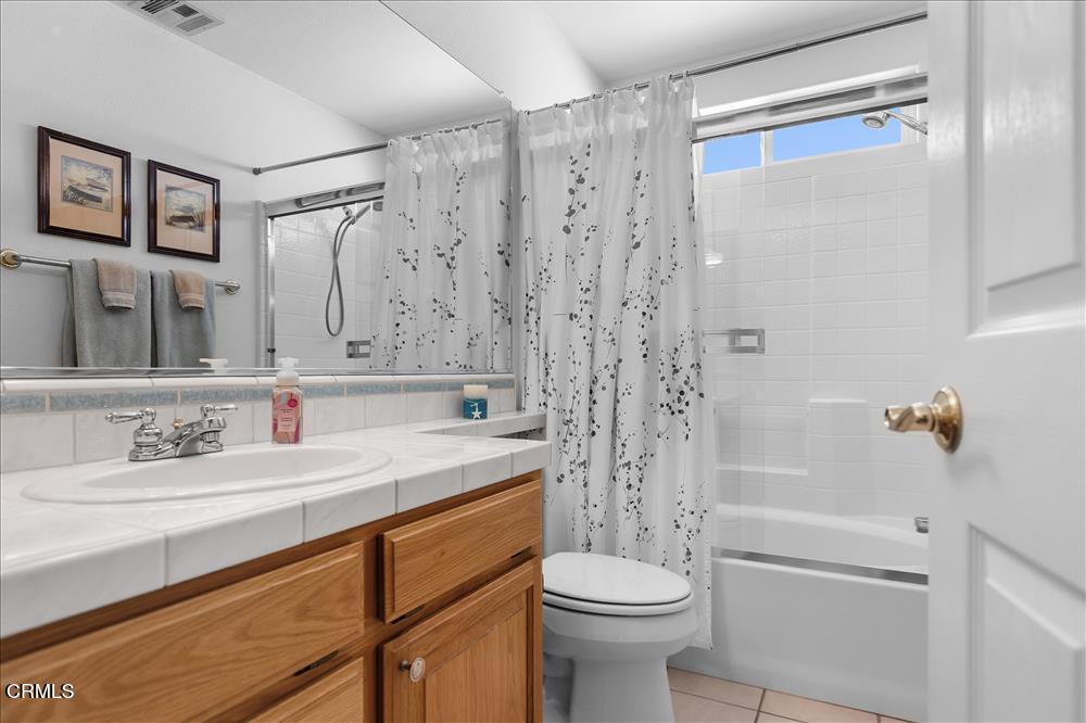 30730 Fox Ridge Court Tehachapi, CA 93561 - Photo 40 of 61 a bathroom with a sink a toilet and shower