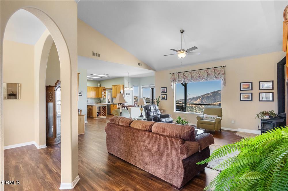 30730 Fox Ridge Court Tehachapi, CA 93561 - Photo 6 of 61 a living room with furniture and a chandelier