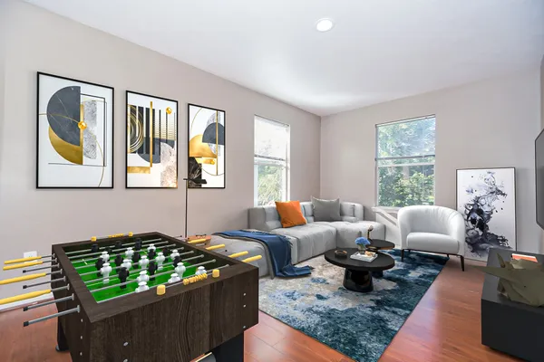 a living room with furniture and a window