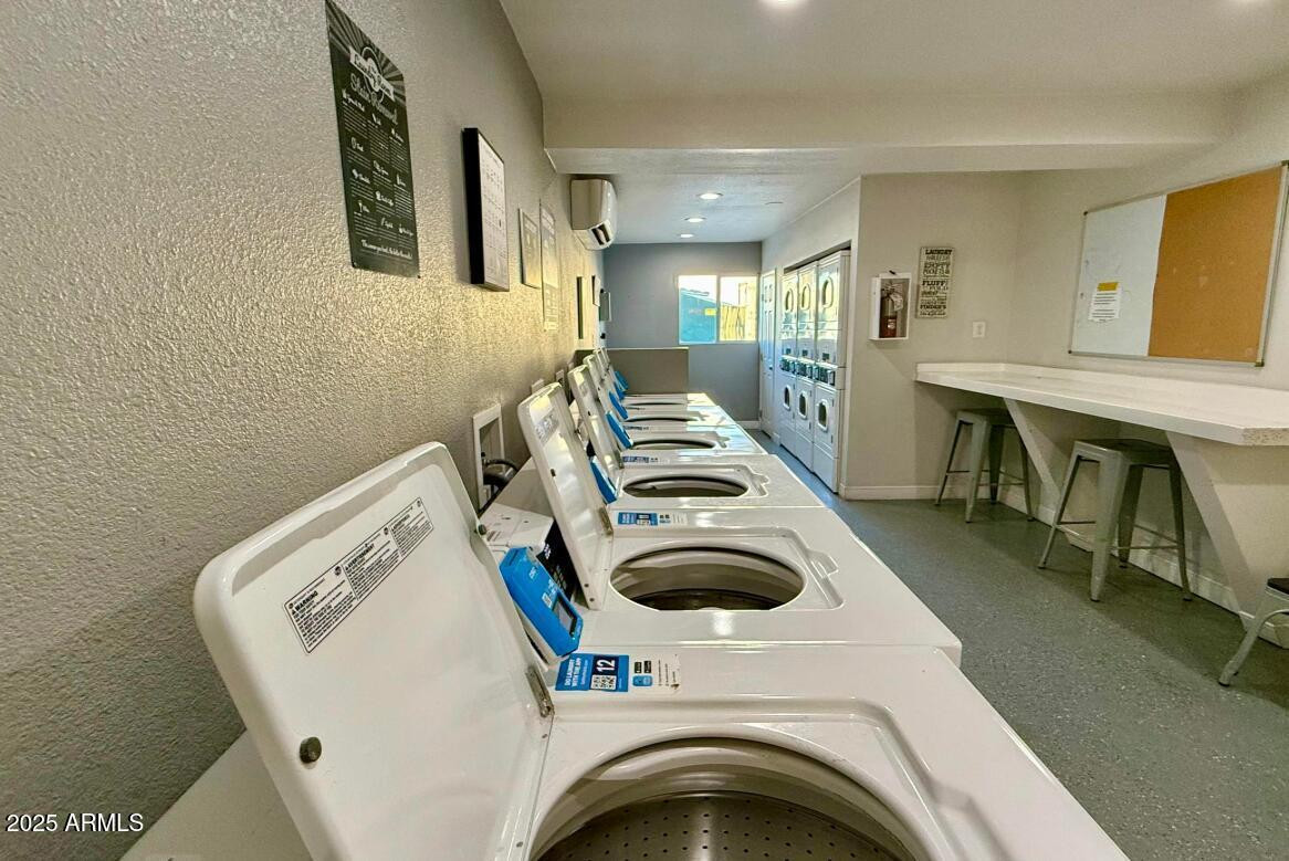2936 East Indian School Road, Unit 1 Phoenix, AZ 85016 - Photo 12 of 12 a view of livingroom with washer and dryer