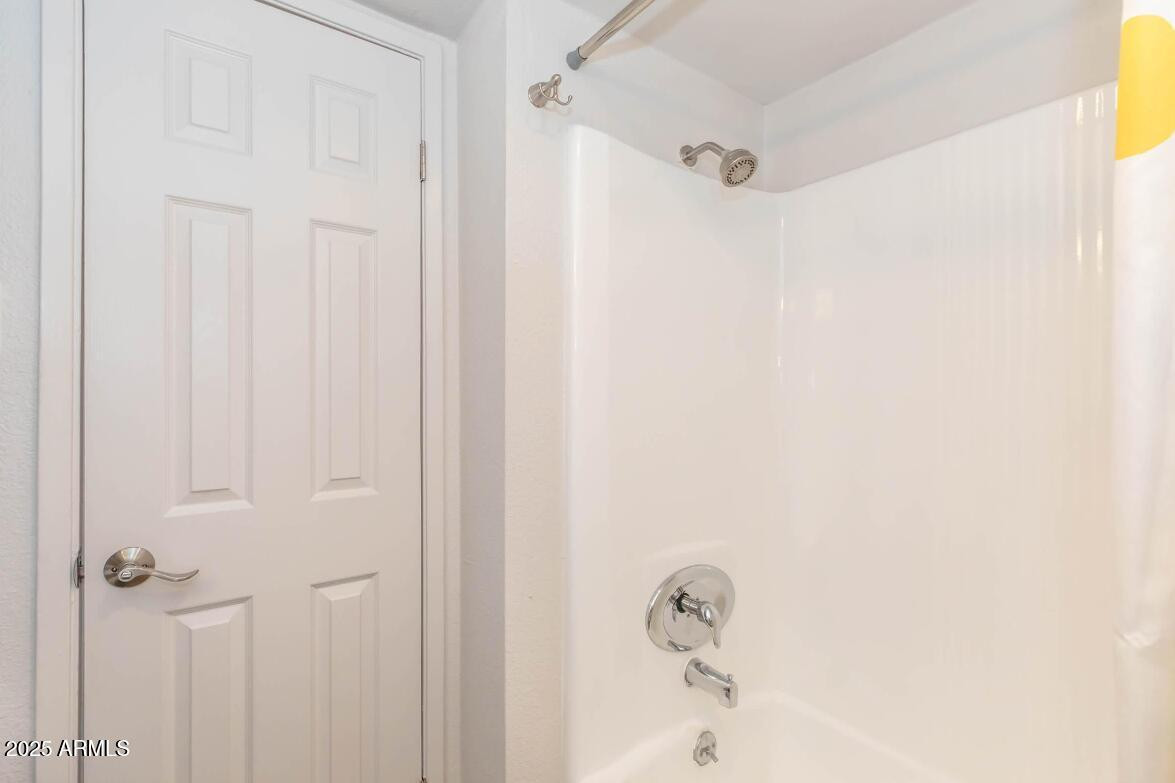 2936 East Indian School Road, Unit 1 Phoenix, AZ 85016 - Photo 7 of 12 a bathroom with a shower