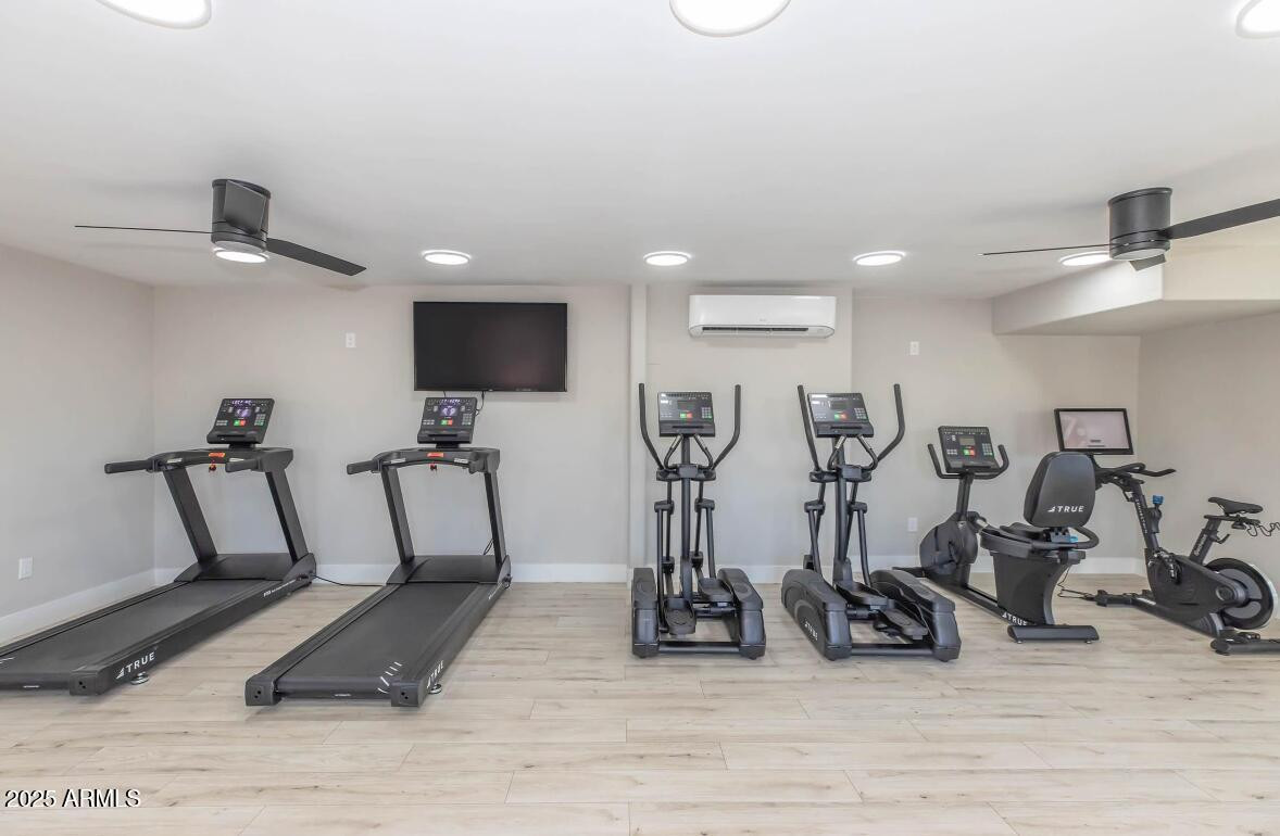 2936 East Indian School Road, Unit 1 Phoenix, AZ 85016 - Photo 9 of 12 a view of a room with gym equipment
