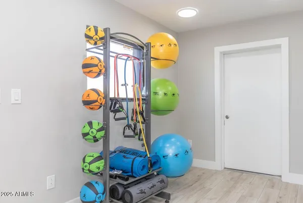 a room with toys and wooden floor