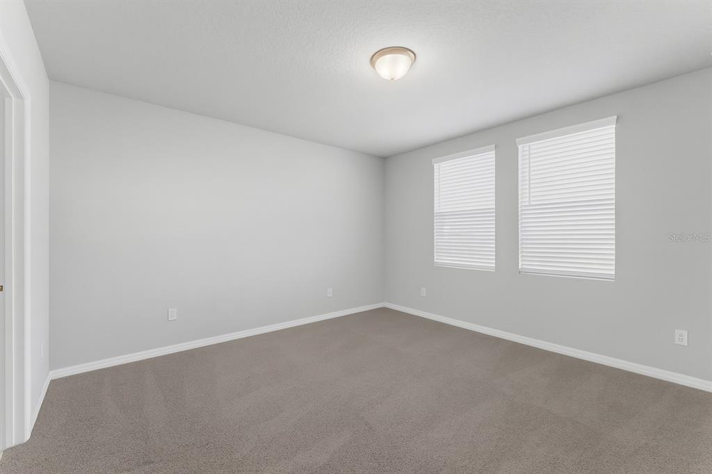 3472 Monaco Drive Davenport, FL 33897 - Photo 11 of 25 an empty room with a window