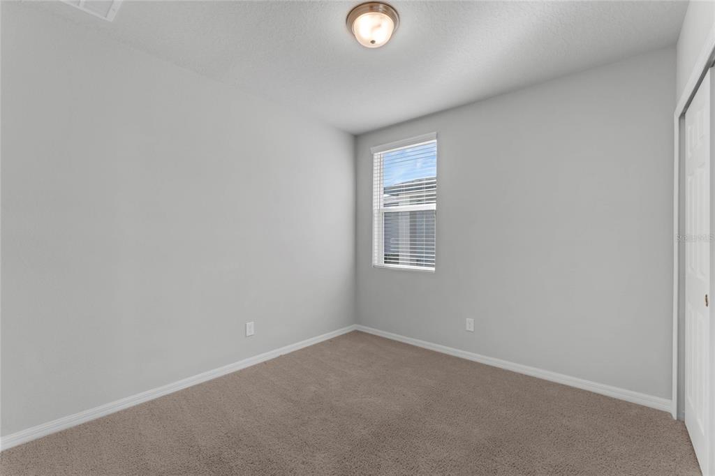 3472 Monaco Drive Davenport, FL 33897 - Photo 15 of 25 a view of a room that has a window in it