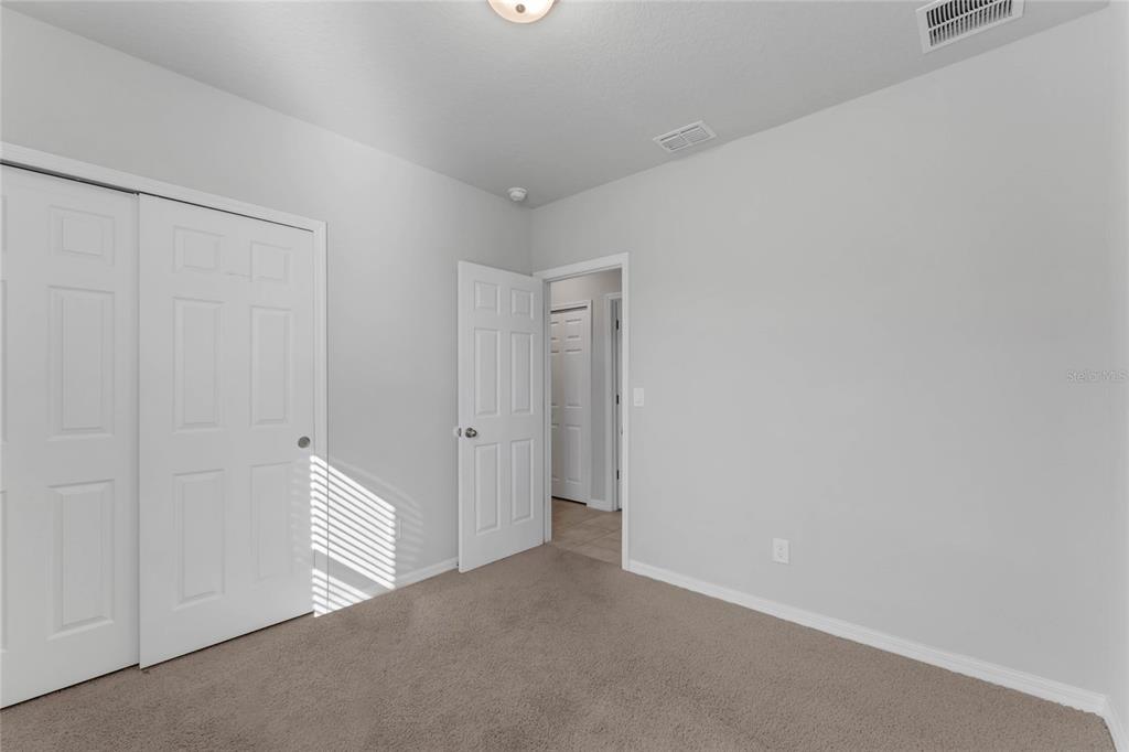3472 Monaco Drive Davenport, FL 33897 - Photo 16 of 25 a view of a hallway