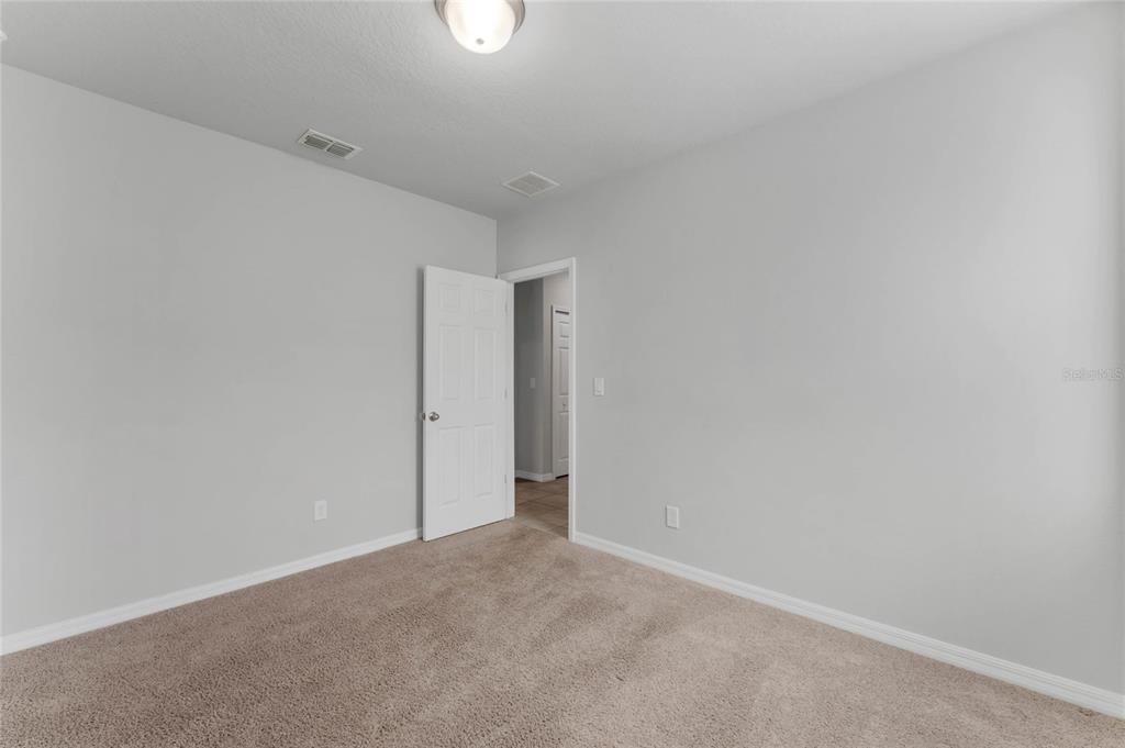 3472 Monaco Drive Davenport, FL 33897 - Photo 19 of 25 a view of an empty room